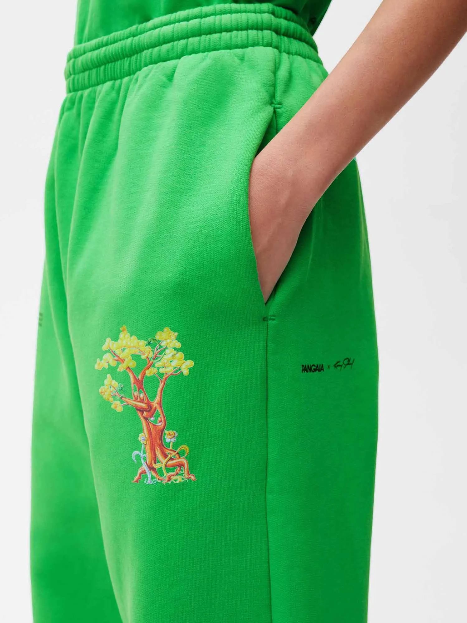 PANGAIA x Kenny Scharf Signature Track Pants—jade green